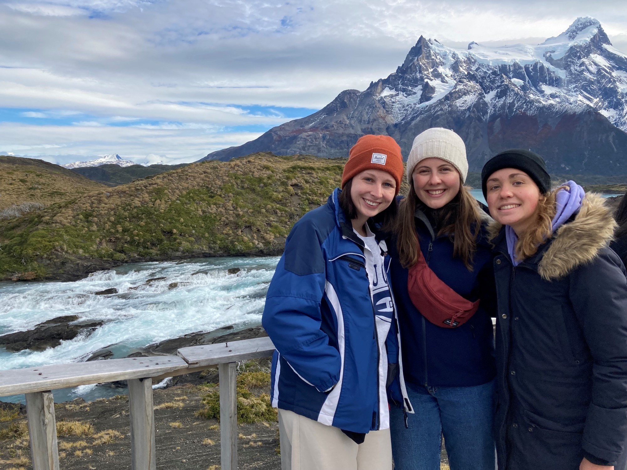 A group of student during study aboard taking picture at a Torres del Paine National Park, Chile.