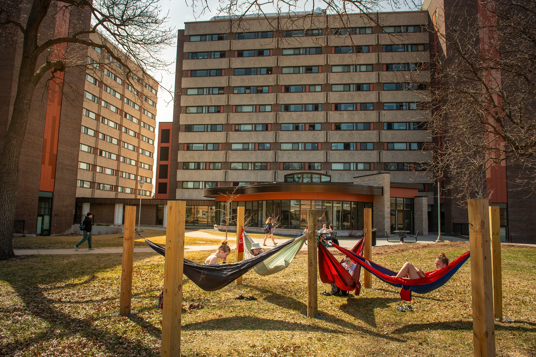 hammocks hanging on upper campus near residence halls 