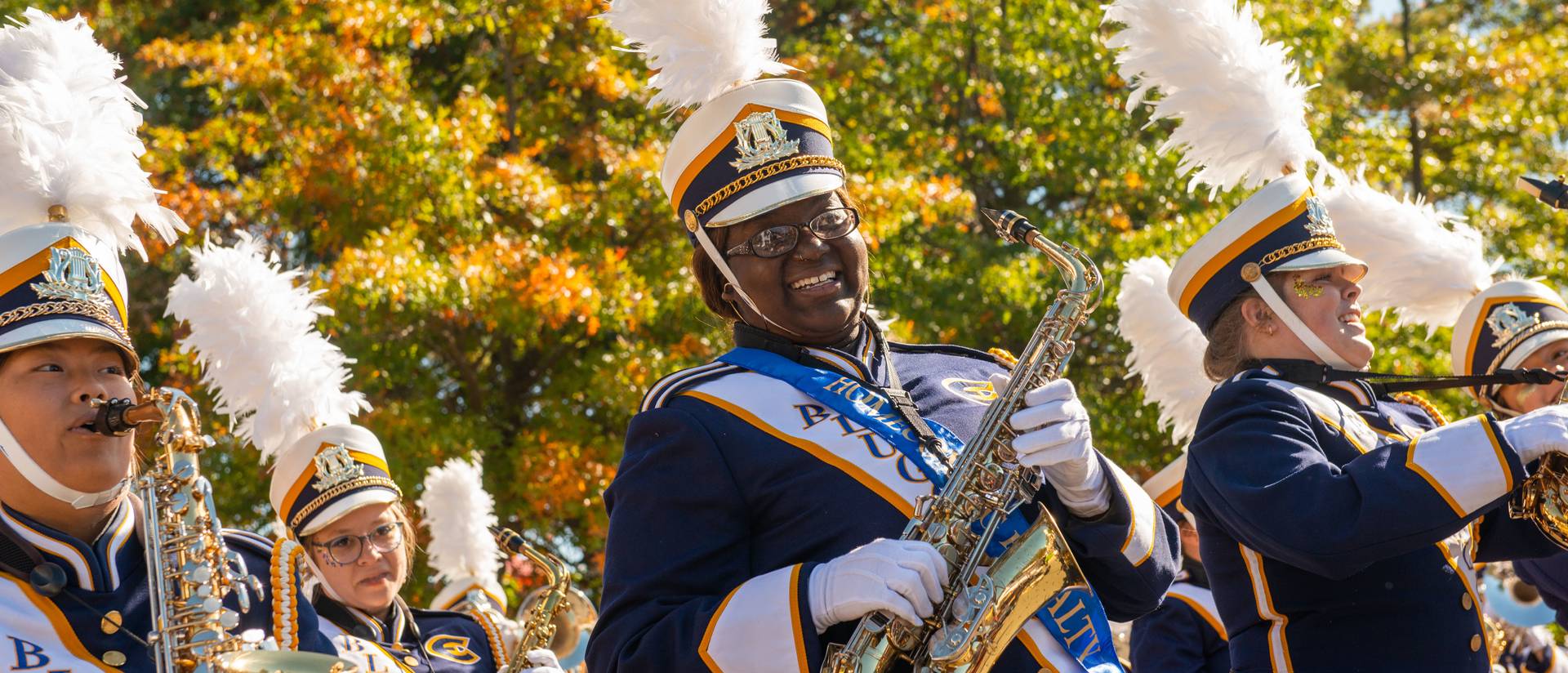 Blugold Marching Band member at Homecoming Parade