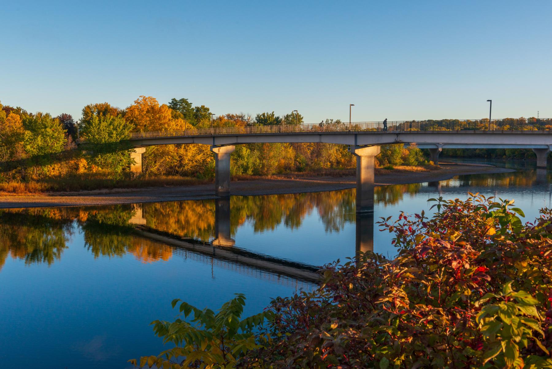 Fall campus scene with footbridge