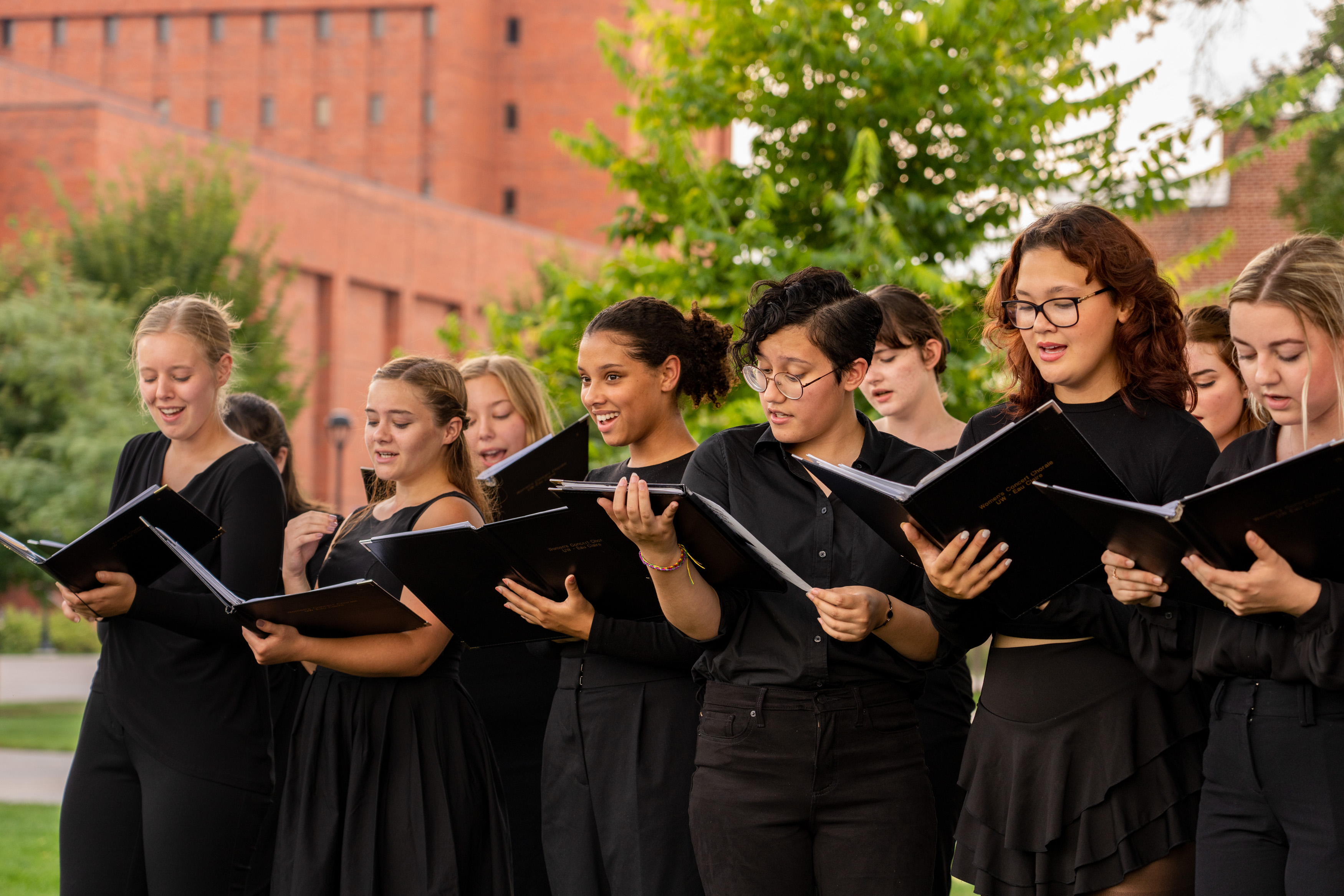 choir class enjoying an outdoor classes rehearsal session