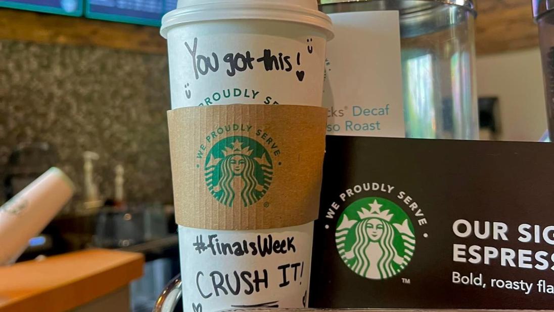 Starbucks cup with Good Luck message for finals
