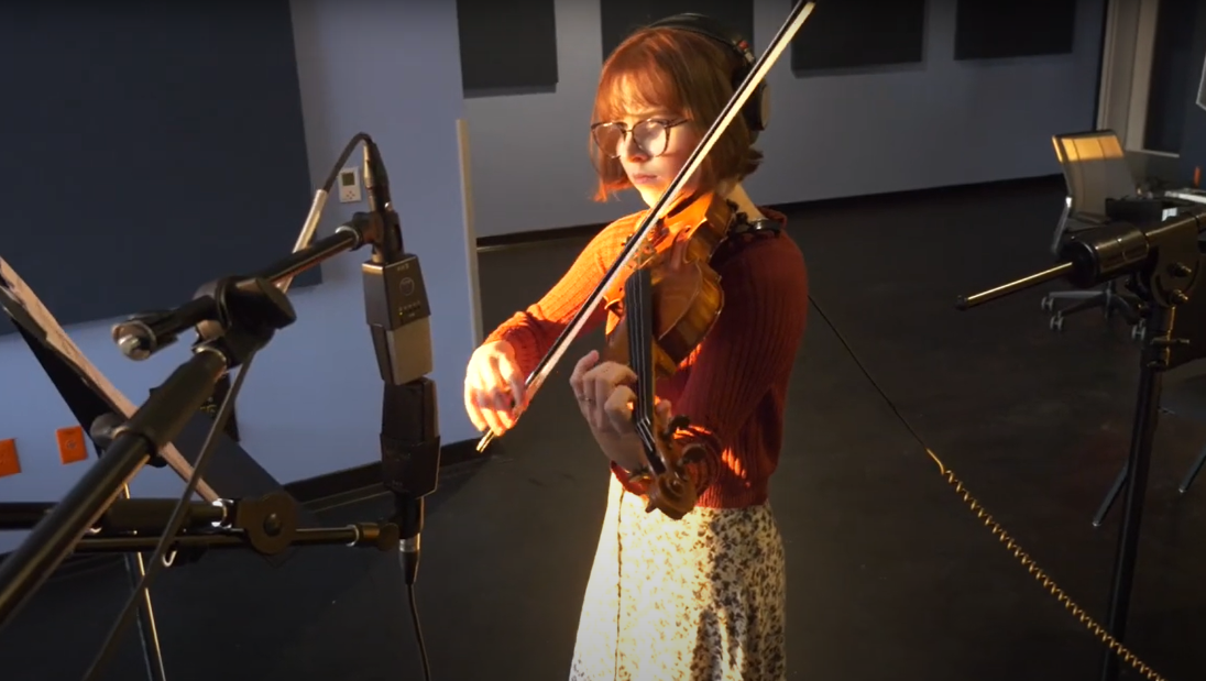 Violinist recording in the Pablo Center recording studio
