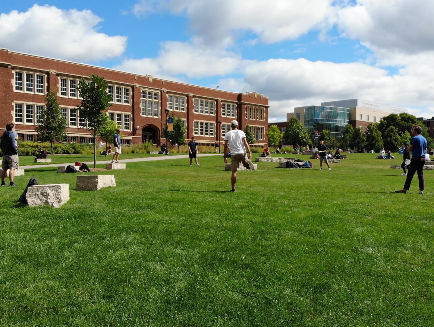 campus mall, frisbee players, summer