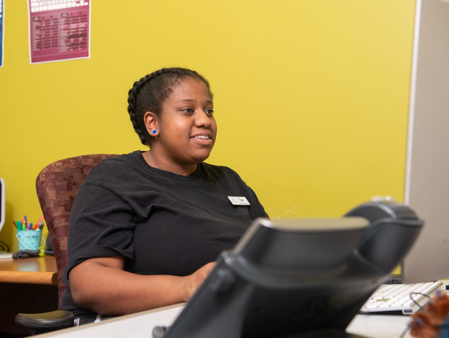 LTS Help Desk student employee at a workstation