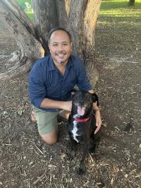 Image of Bobby Lith with his dog, Louie.