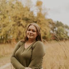 Abigale posing outdoors.