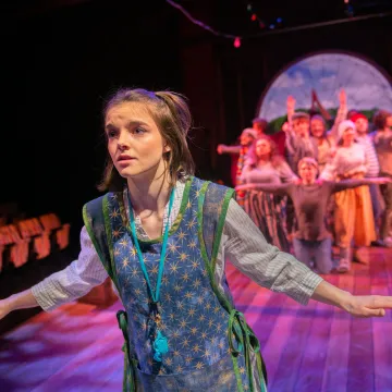 students on stage in Starcatcher performance 