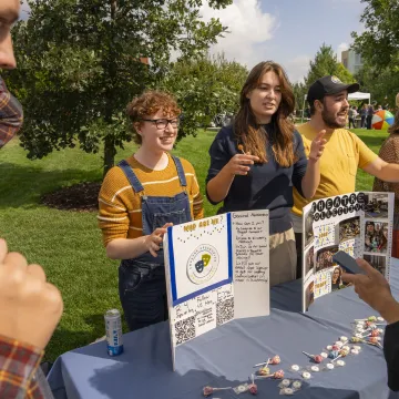 students exploring student orgs at outdoor event 