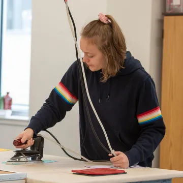 Student working in the Costume Shop at the Pablo Center 