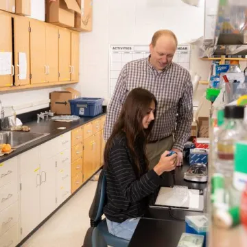 Faculty and student in lab