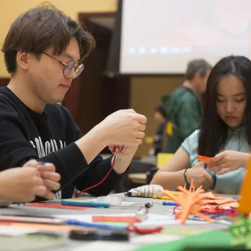 College students in Davies getting creative with crafts.