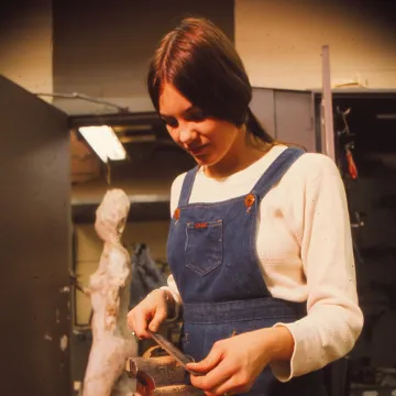 student in metalworks art class in 1976