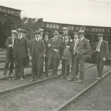 group of students at railway station 1920s 