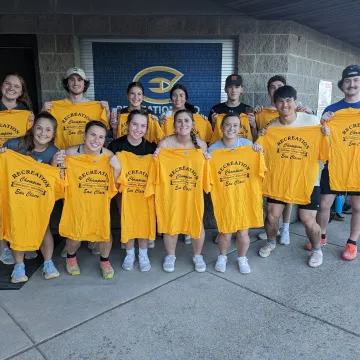 Kickball team poses with their Intramural Shirts