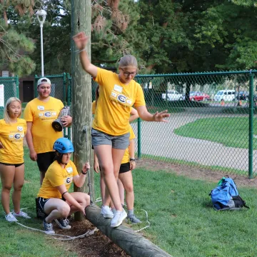 Students do low level ropes course for team building