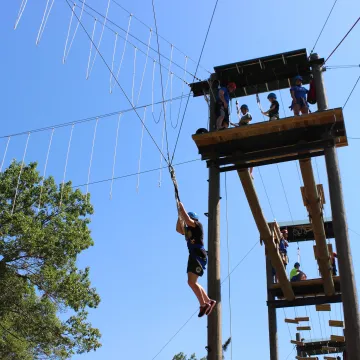 Students on high level ropes course