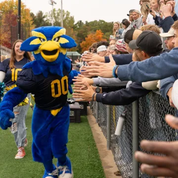 Blu on sidelines at HOCO football game 