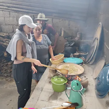 Student having a cooking lesson with locals in Guatemala 