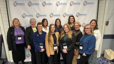 Nursing conference group shot of faculty and grad students 