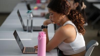 female student listening in class