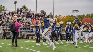 football players on field during game