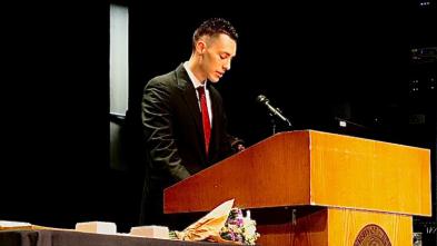 student speaks at podium