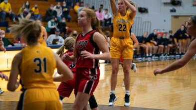 Tyra Boettcher women's basketball shooting a basket