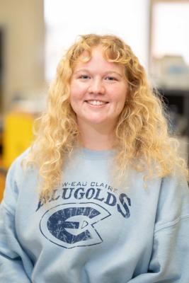 Addy Farber, biomed scholar, headshot in Blugold sweatshirt