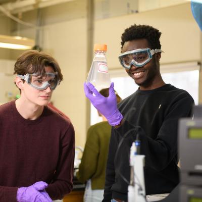 students in the chem lab holding Erlenmeyer Flask