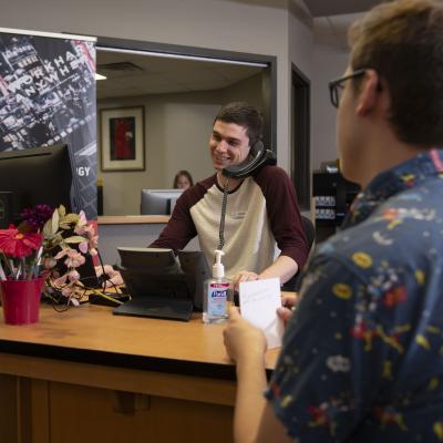 Help Desk student assisting client 