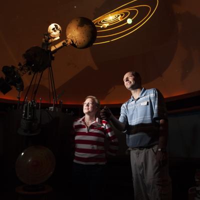 Image of the planets being projected on the ceiling of the L.E. Phillips Planetarium