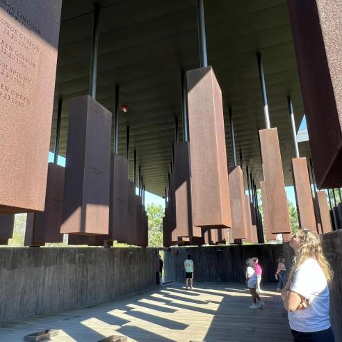 An image of student explore the national memorial for peace and justice in the Civil rights pligrimage immersion trip