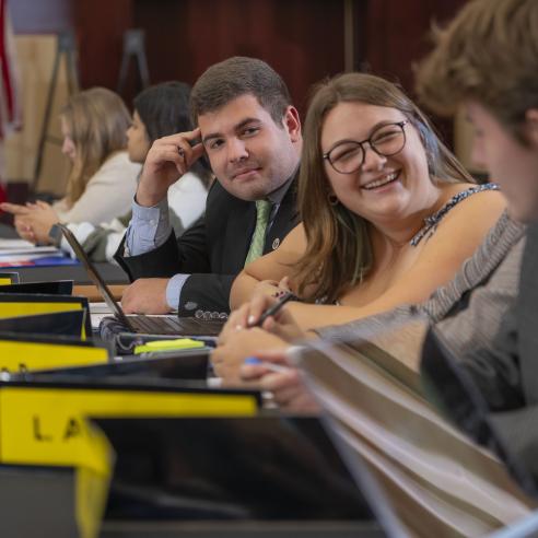 A picture of a group of students in the senate meeting