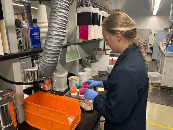 female student in chemistry lab