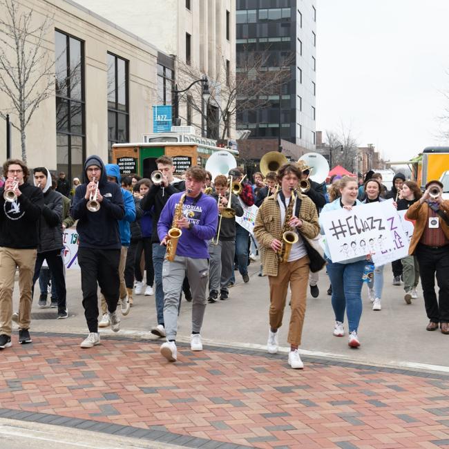 Group of musicians playing instrument for the Jazz Festival throughout downtown Eau Claire