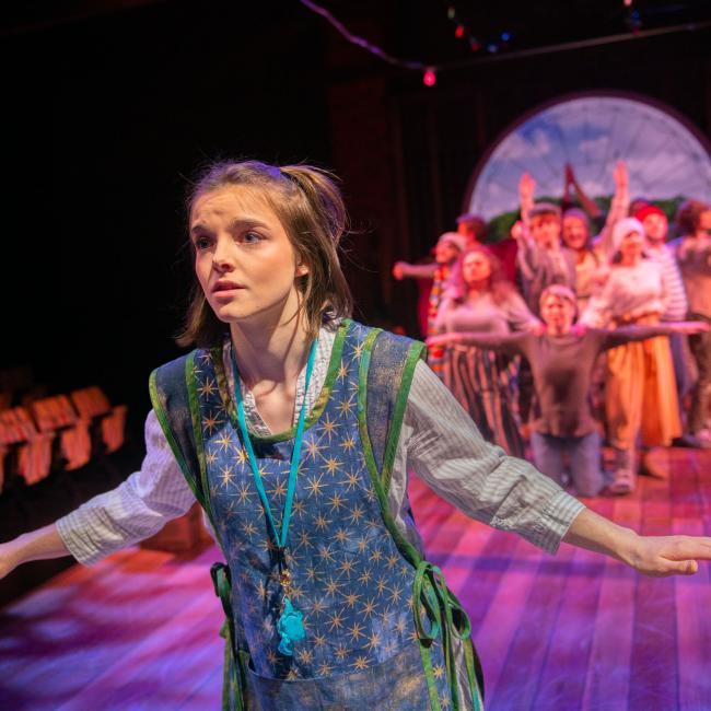 students on stage in Starcatcher performance 