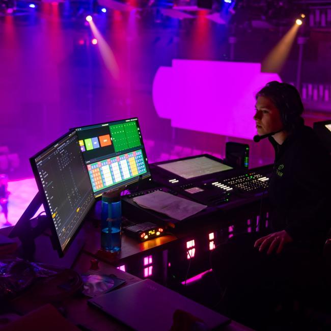 Student working in the Light, Sound, and Video Projection Lab at the Pablo Center 