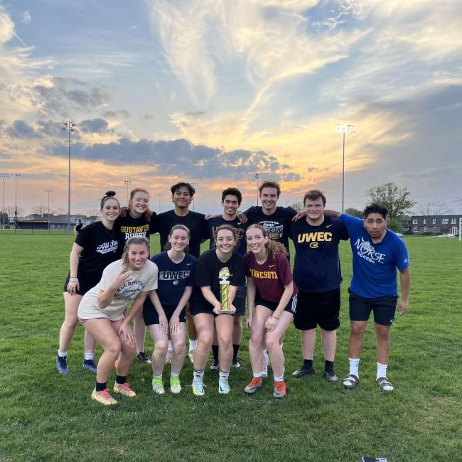 Intramural soccer team poses with their trophy