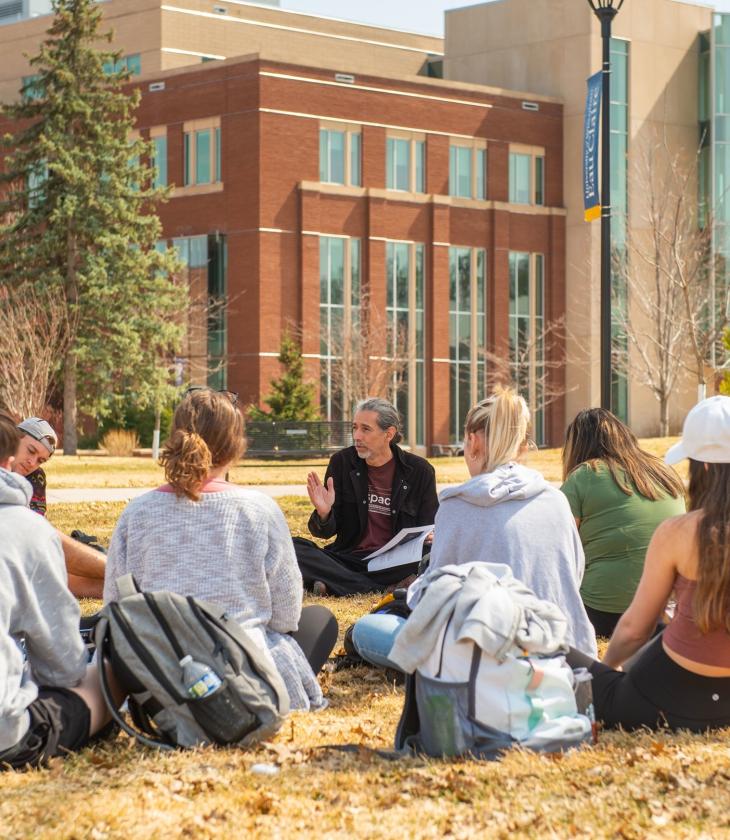 LAS literature class outdoors with Manny Fernandez 