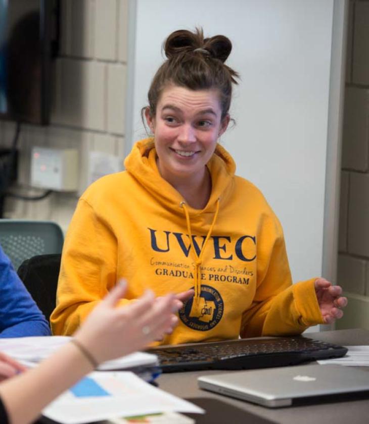 CSD grad student in dept sweatshirt