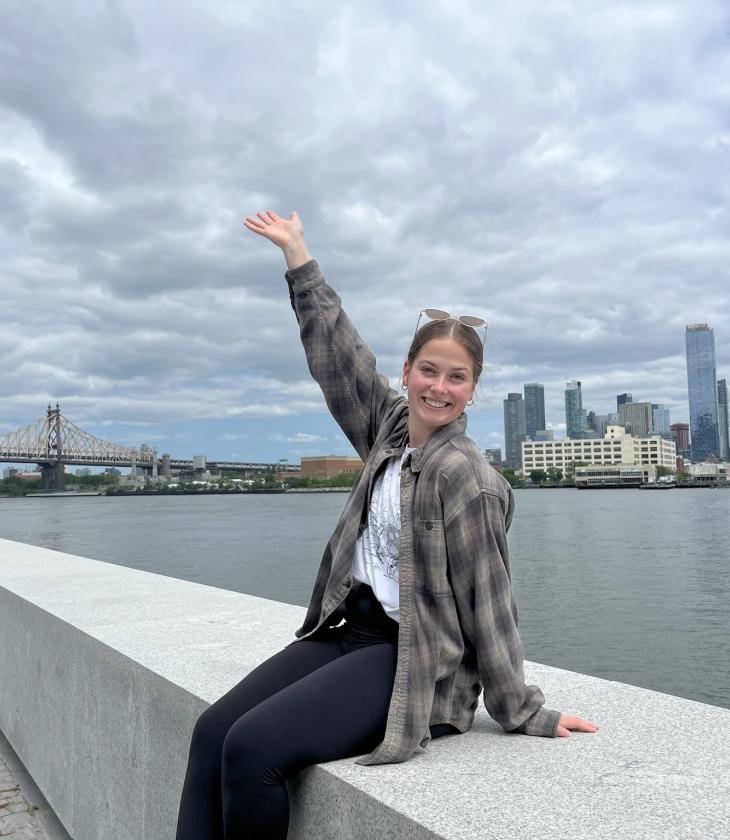 A picture of student from NSE program taking a picture with New York City skyline and Queensboro Bridge