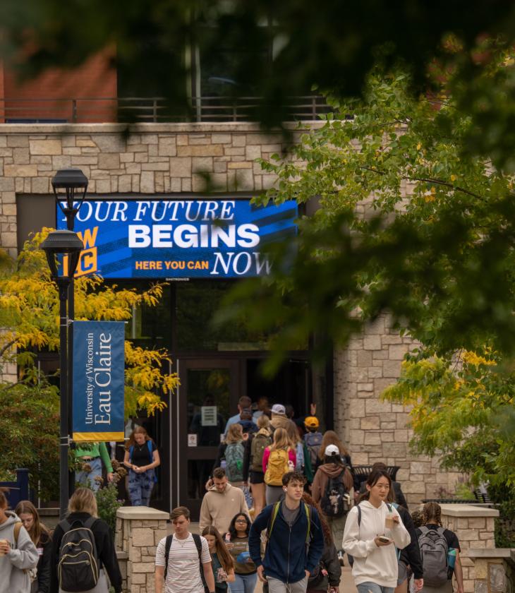 crowd of students passing on the mall at Davies Center 