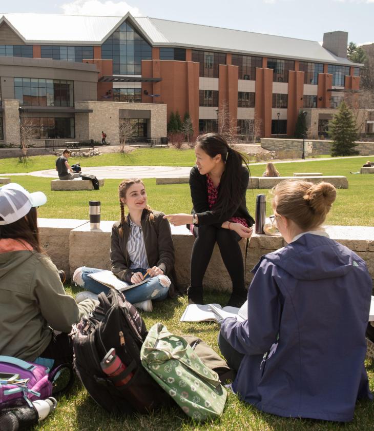 Students in a Chinese language class learning outdoors