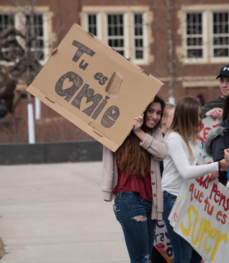 French students spreading positivity via signs on campus