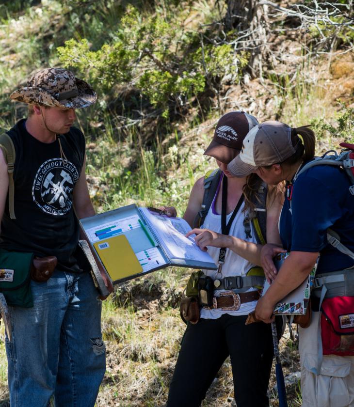 Geology students working on a capstone project outdoors