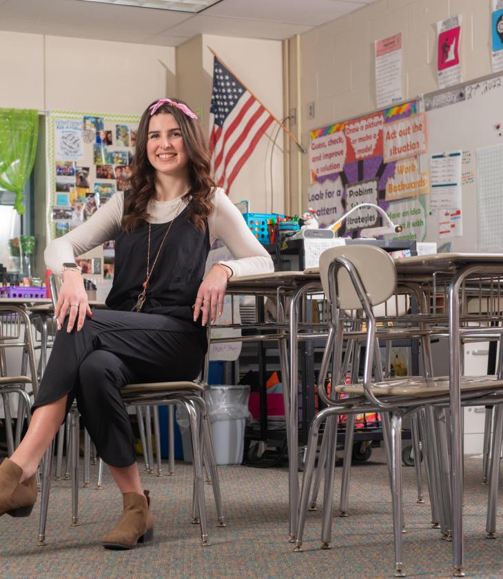 Blugold Elementary Education graduate Abbi Holzmann portraits in a Northstar Middle School classroom.