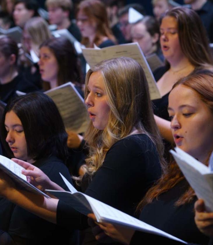 female choral singers in black dresses