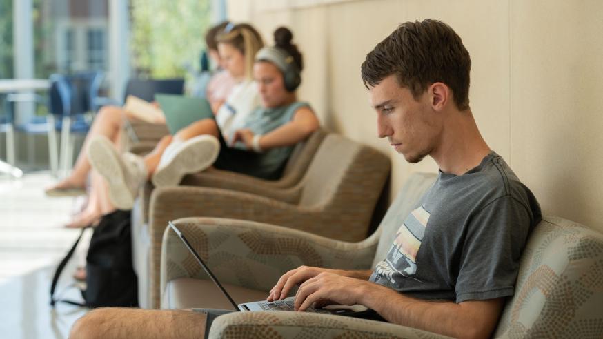 male student studying