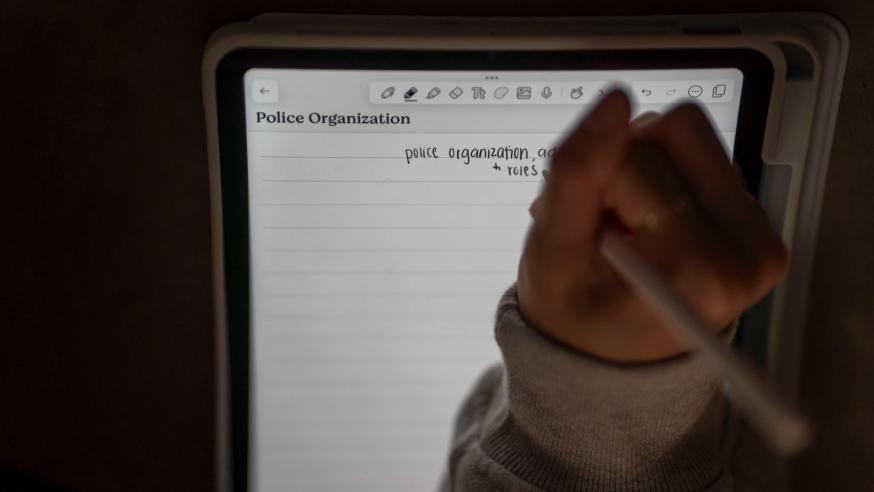 tablet screen with Police Organization header